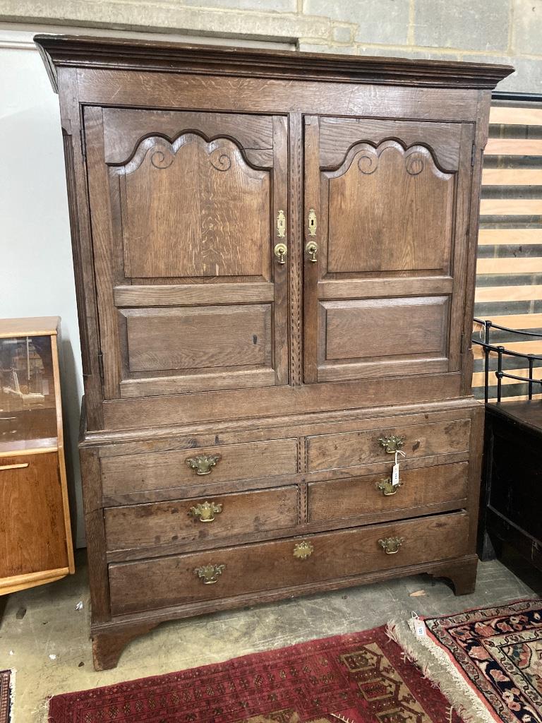 A George III inlaid oak press cupboard, width 140cm, depth 60cm, height 184cm